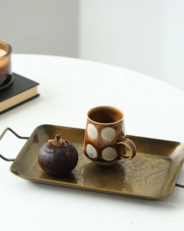Imported Engraved Brass Twin-Handle Tray, French Vintage in brushed brass — in a room setting