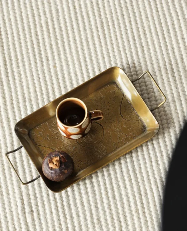 Imported Engraved Brass Twin-Handle Tray, French Vintage in brushed brass — in a room setting
