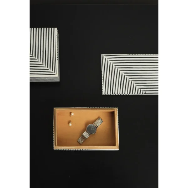 Black and White Line-Pattern Decorative Boxes in black — in a room setting