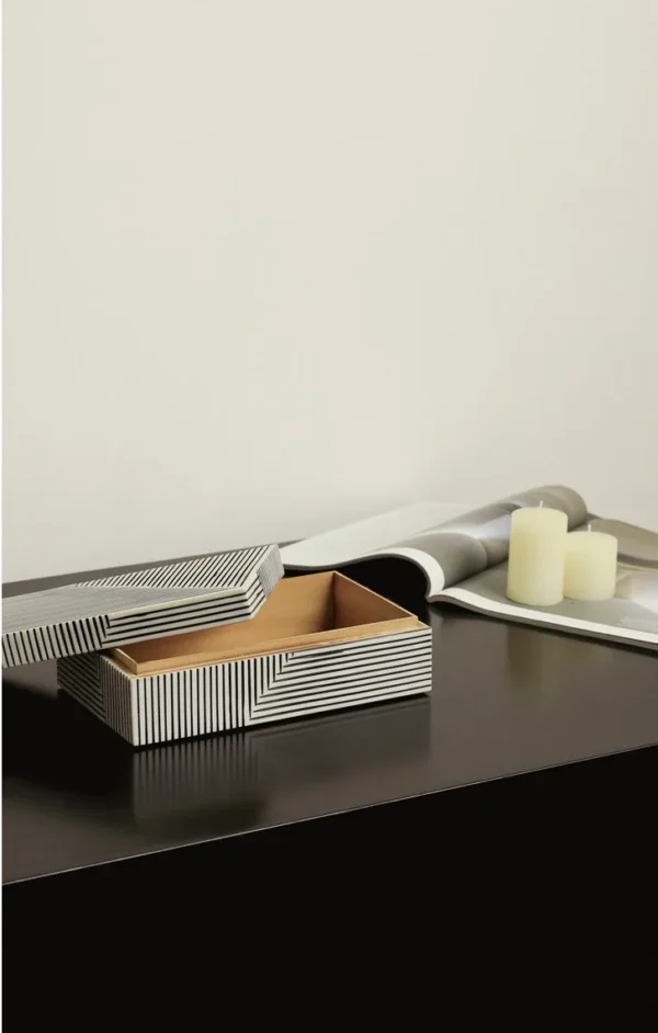 Black and White Line-Pattern Decorative Boxes in black — in a room setting
