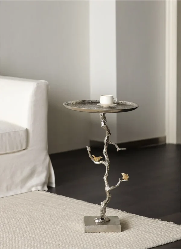 Moonlight Branch Cast Aluminium Side Table with Birds in silver — in a room setting
