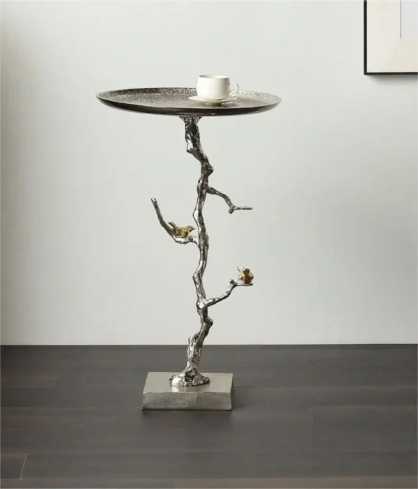 Moonlight Branch Cast Aluminium Side Table with Birds in silver — in a room setting