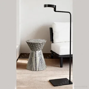 Geometric Diamond Capiz Shell Hourglass Side Table in black — in a room setting