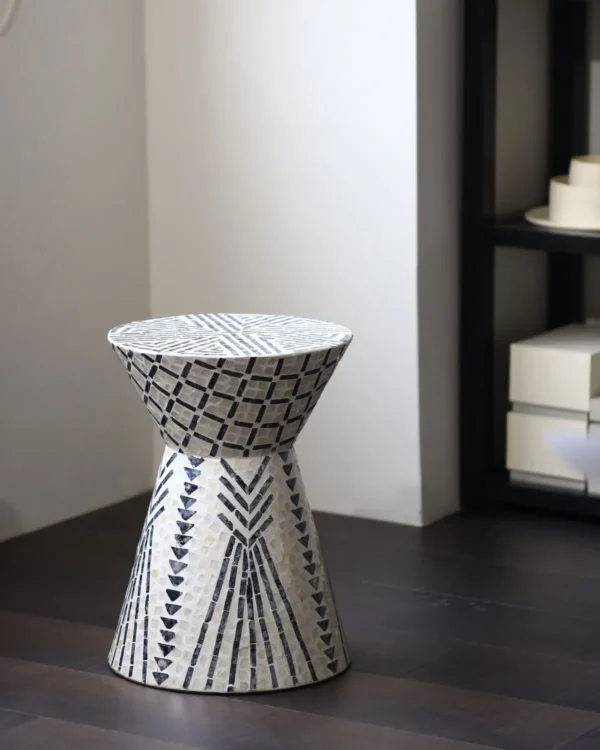 Geometric Diamond Capiz Shell Hourglass Side Table in black — in a room setting