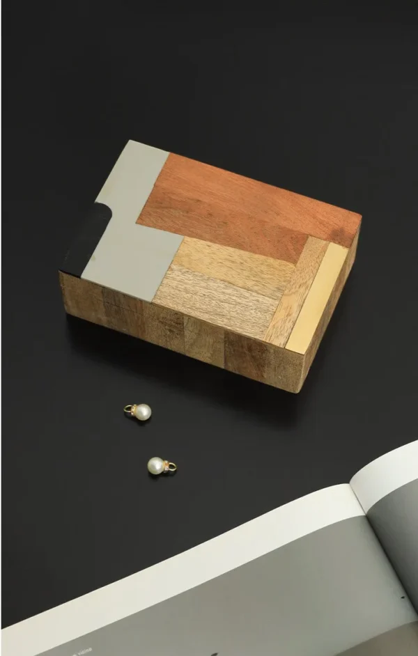 Mango Wood and Resin Patchwork Box in natural oak — in a room setting