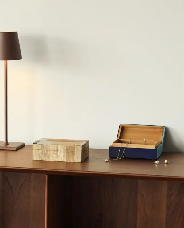 Mango Wood and Resin Patchwork Box in natural oak — in a room setting