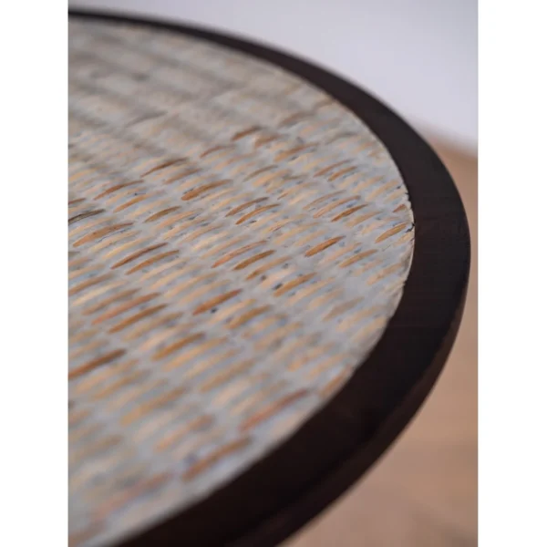 Imprint Hand-Carved Solid Wood Side Table with Woven Top in clay — in a room setting
