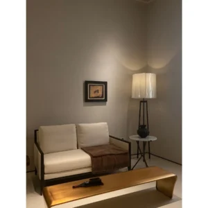 Loveseat in Cream Fabric with Black Oak Frame, 146 cm — in a room setting