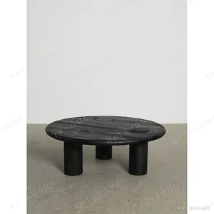 Ink Black Ash Round Coffee Table with Inset Discs, 100 cm in black — in a room setting