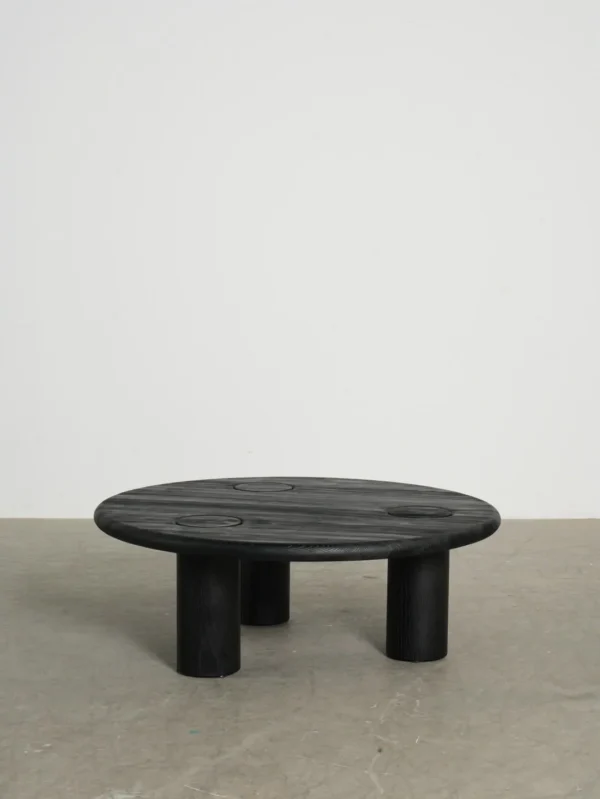 Ink Black Ash Round Coffee Table with Inset Discs, 100 cm in black — in a room setting