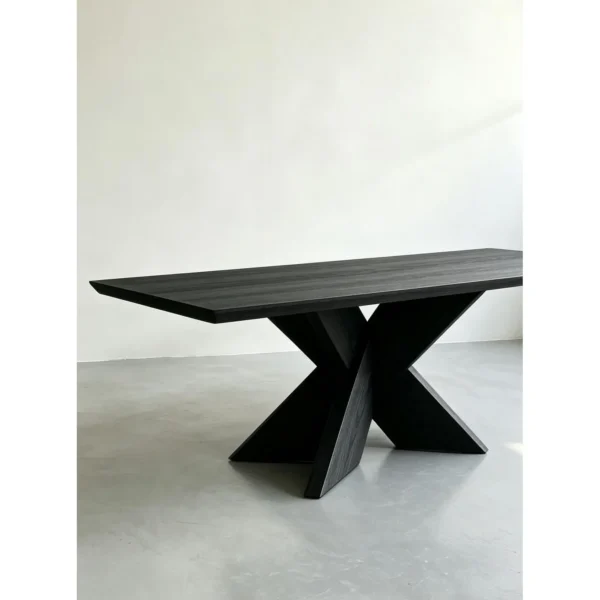 Ink-Dyed Carbonised Ash Dining Table with X Base in black — in a room setting