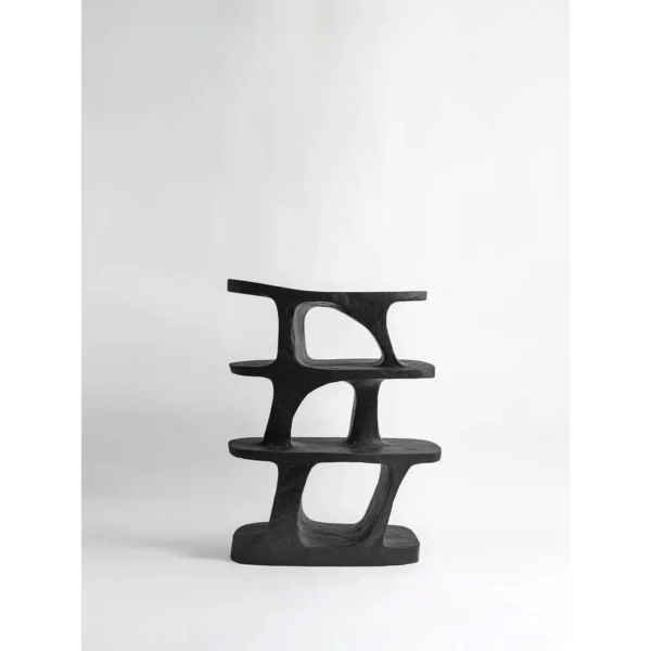 Ink Rock Sculptural Bookcase in Matte Black — in a room setting