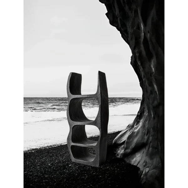 Ink Rock Sculptural Bookcase in Matte Black — in a room setting