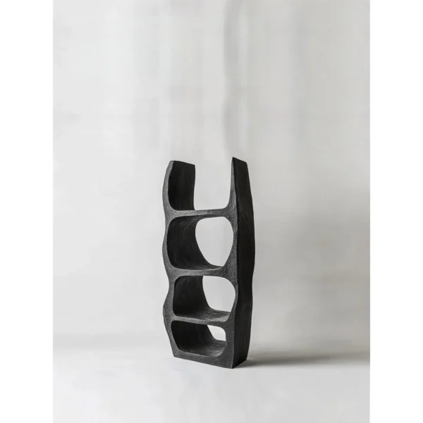 Ink Rock Sculptural Bookcase in Matte Black — in a room setting