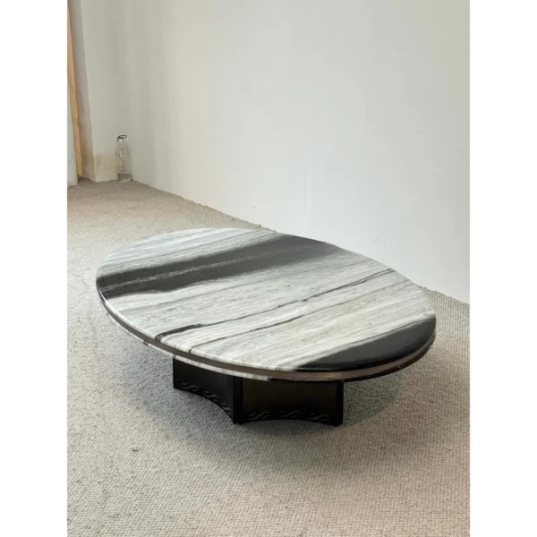 Round Panda White Marble Coffee Table in ivory — in a room setting