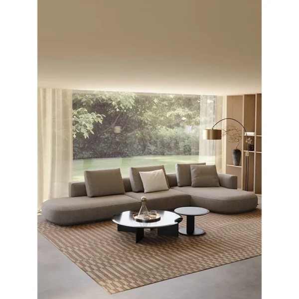Irregular Corner Sofa in clay — in a room setting