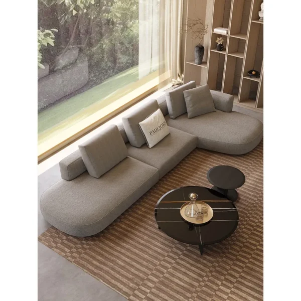 Irregular Corner Sofa in clay — in a room setting