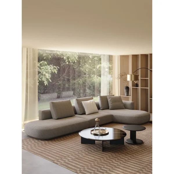 Irregular Corner Sofa in clay — in a room setting