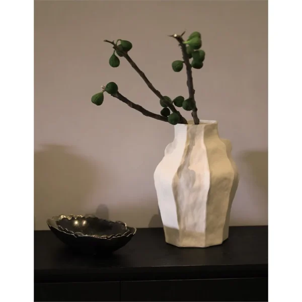 Designer Faceted Sand-Texture Ceramic Vase in mustard — in a room setting