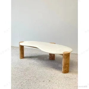 Irregular White Travertine Coffee Table in oatmeal — in a room setting