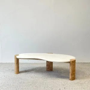 Irregular White Travertine Coffee Table in oatmeal — in a room setting