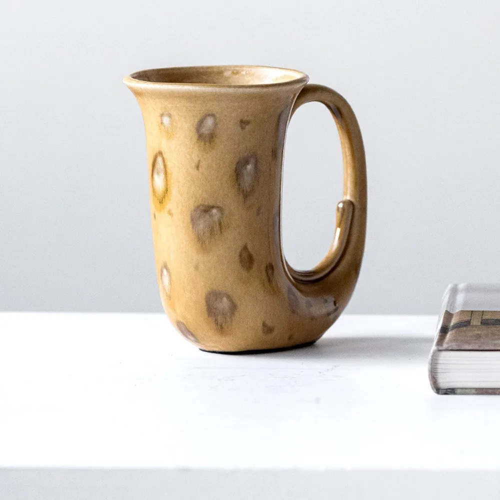 Hand-Made Speckled Ochre Ewer Vase in mustard — front view