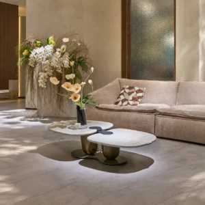Symbiotic Two-Lobe Travertine Coffee Table, 142 cm in oatmeal — front view