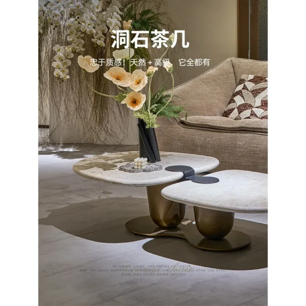 Symbiotic Two-Lobe Travertine Coffee Table, 142 cm in oatmeal — in a room setting