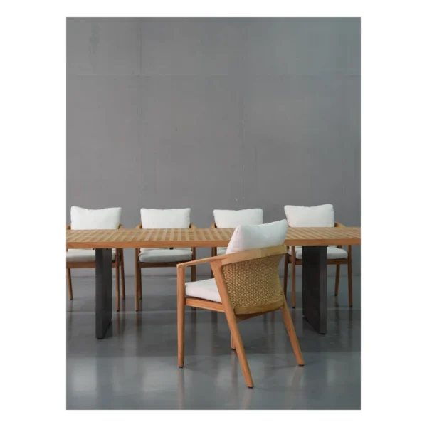 Teak Lattice Outdoor Table in natural oak — in a room setting