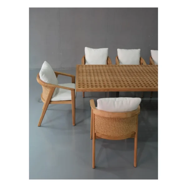 Teak Lattice Outdoor Table in natural oak — in a room setting