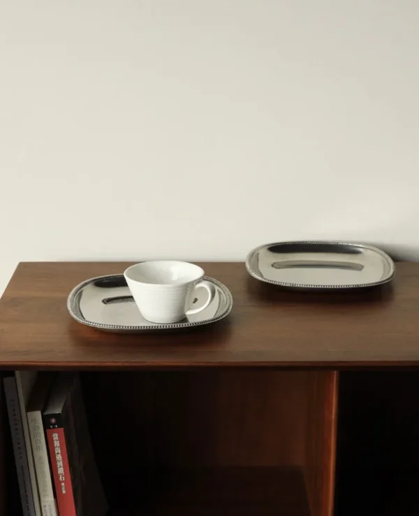 Italian Baroque Stainless Steel Trays, Oval, Twin-Handle or in silver — in a room setting