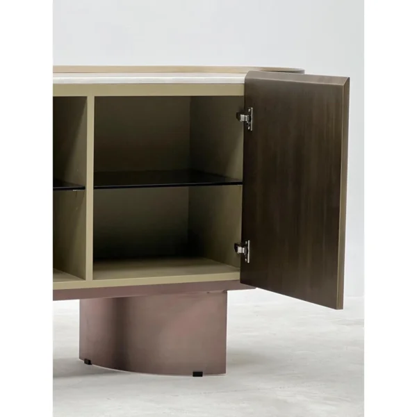 Brushed Bronze Oval Sideboard with Stone Top in bronze — in a room setting