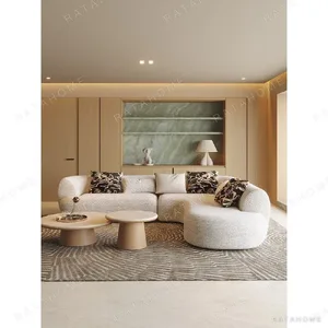 Italian Curved Corner Sofa in oatmeal — in a room setting
