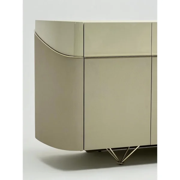 Curved Beige Sideboard with Stone Top on Slim Metal Legs in sand — in a room setting