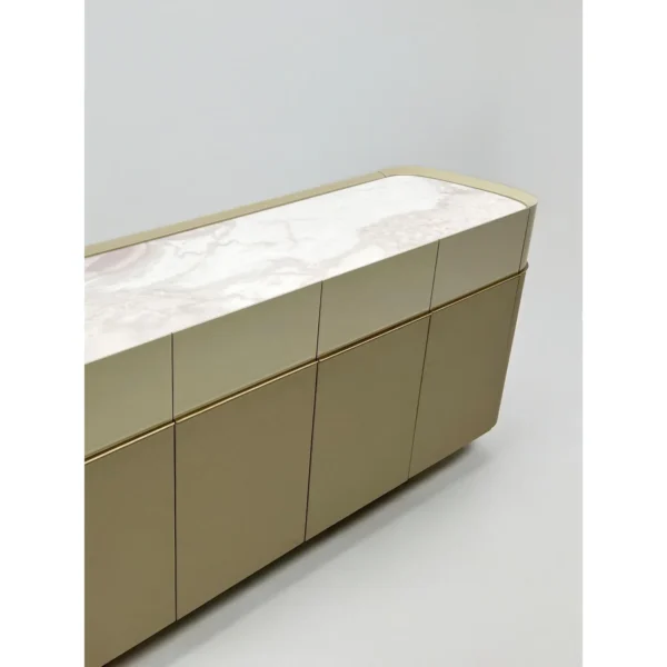 Curved Beige Sideboard with Stone Top on Slim Metal Legs in sand — in a room setting