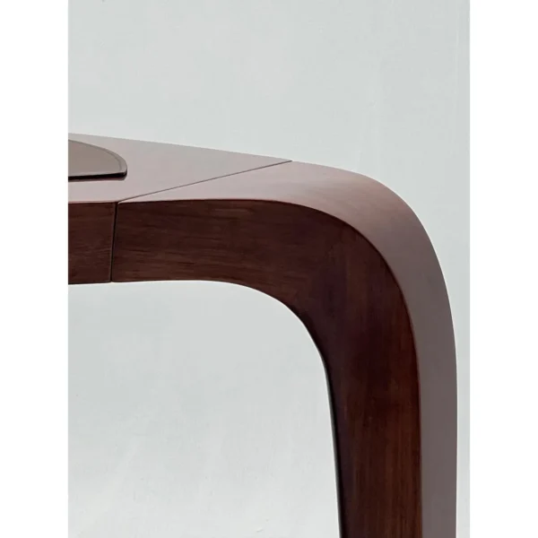 Curved Boat-Shaped Solid Wood Executive Desk in walnut — in a room setting
