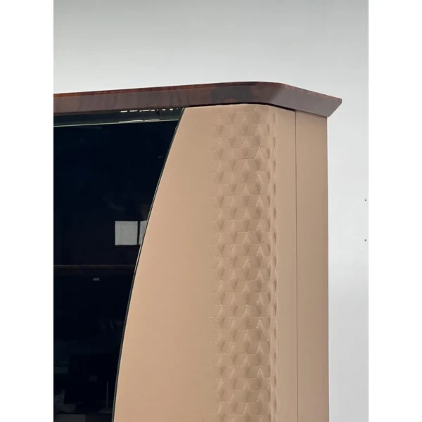 Leather-Wrapped Display Cabinet in sand — in a room setting