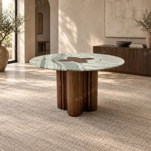 Green Stone Round Dining Table on Bent-Wood Wave Base in olive — in a room setting