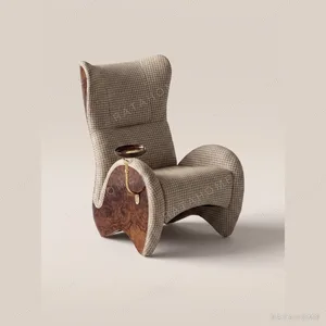 Italian Cigar Lounge Chair in clay — in a room setting
