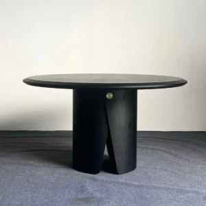 Black Round Dining Table on Sculpted Split Pedestal in black — front view