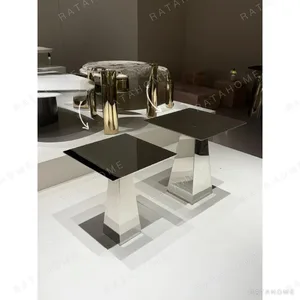 Mirror Steel Square Side Table on Tapered Wedge Base in silver — in a room setting