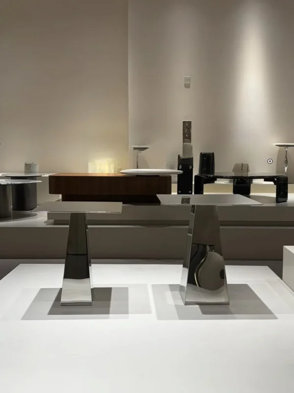 Mirror Steel Square Side Table on Tapered Wedge Base in silver — in a room setting