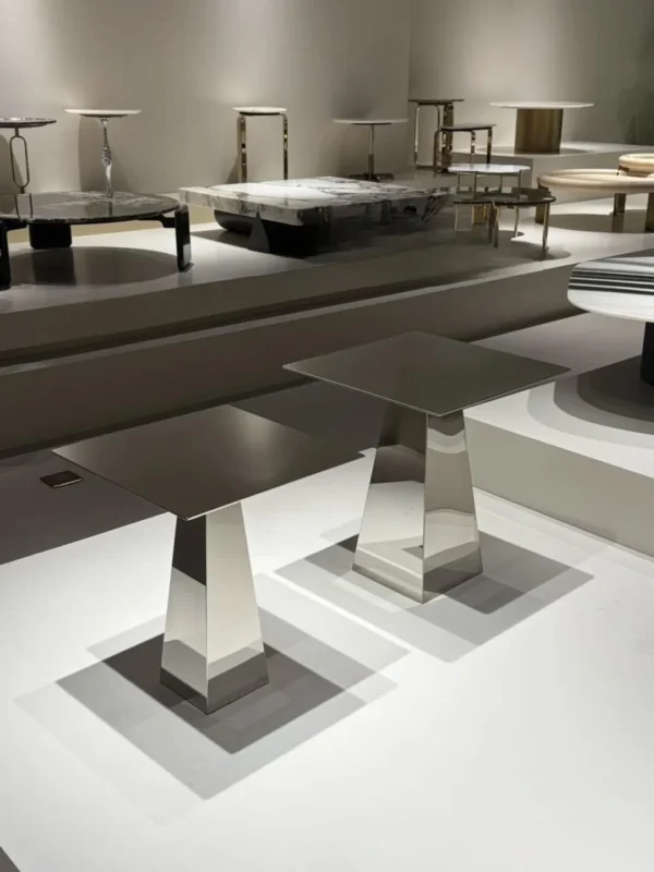 Mirror Steel Square Side Table on Tapered Wedge Base in silver — in a room setting
