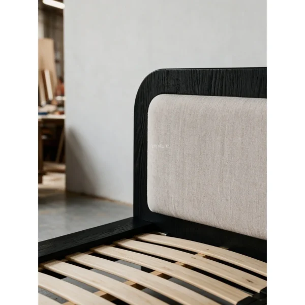 Iva Black Ash Bed with Linen Headboard in black — in a room setting