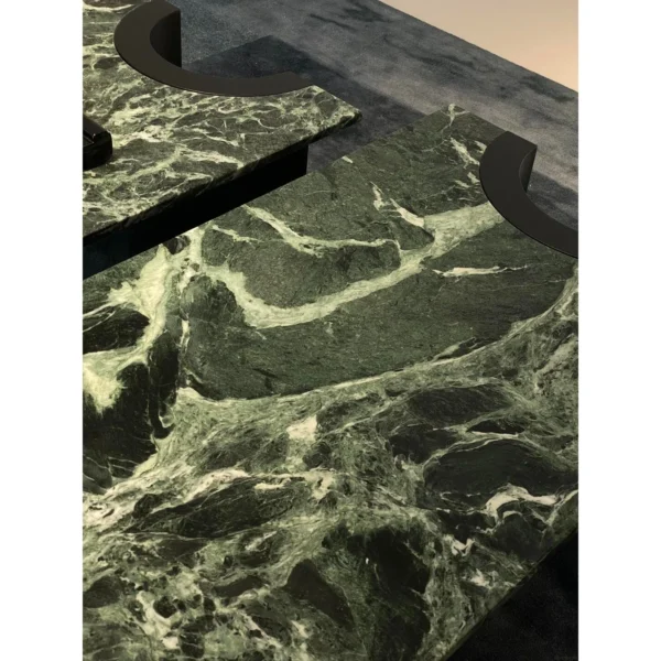 Jasper Long Green Marble Coffee Table on Black Wood Legs in olive — in a room setting