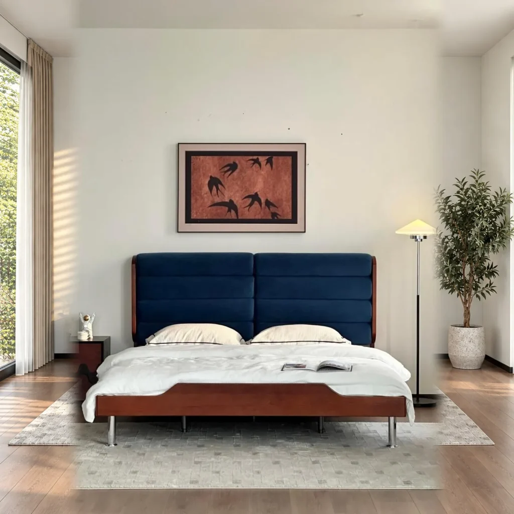 Blue Swirl Curved-Headboard Bed with Boxwood Base in blue — front view