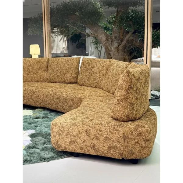 Double-Sided Petal Modular Sofa in olive — in a room setting