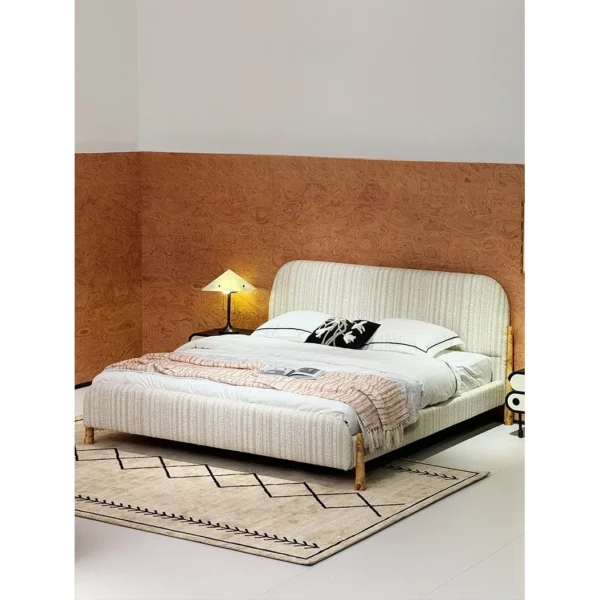 First Snow Ribbed Fabric Bed with Wood Trim in ivory — in a room setting