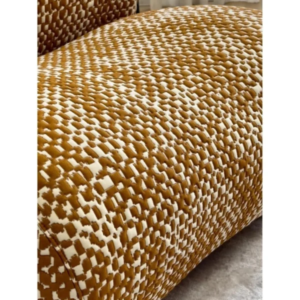 Hebe Curved Bouclé Lounge Chair with Ottoman in Amber Tweed — in a room setting