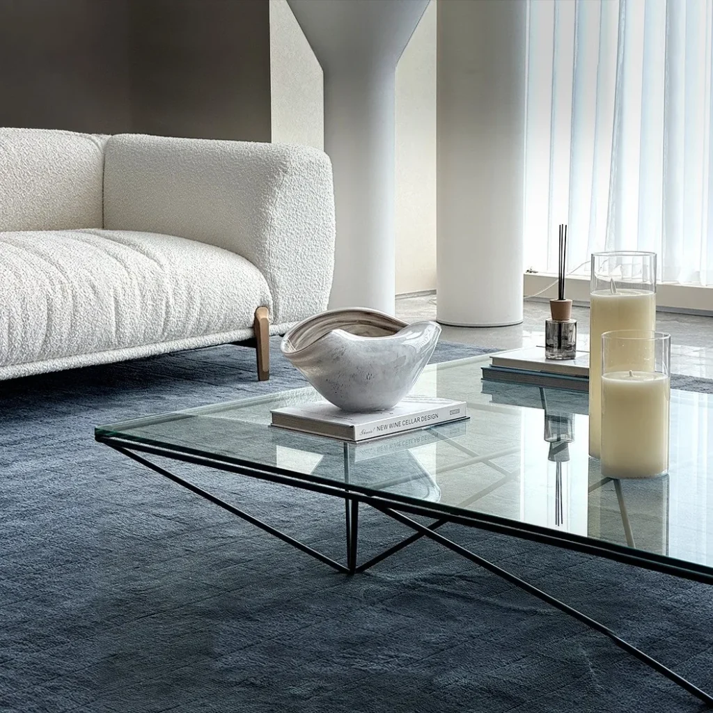 Iron Ridge Glass Coffee Table on Crossed Black Frame, 120 cm in black — front view